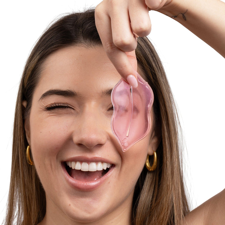 Woman holding Lush Lips hydrogel product