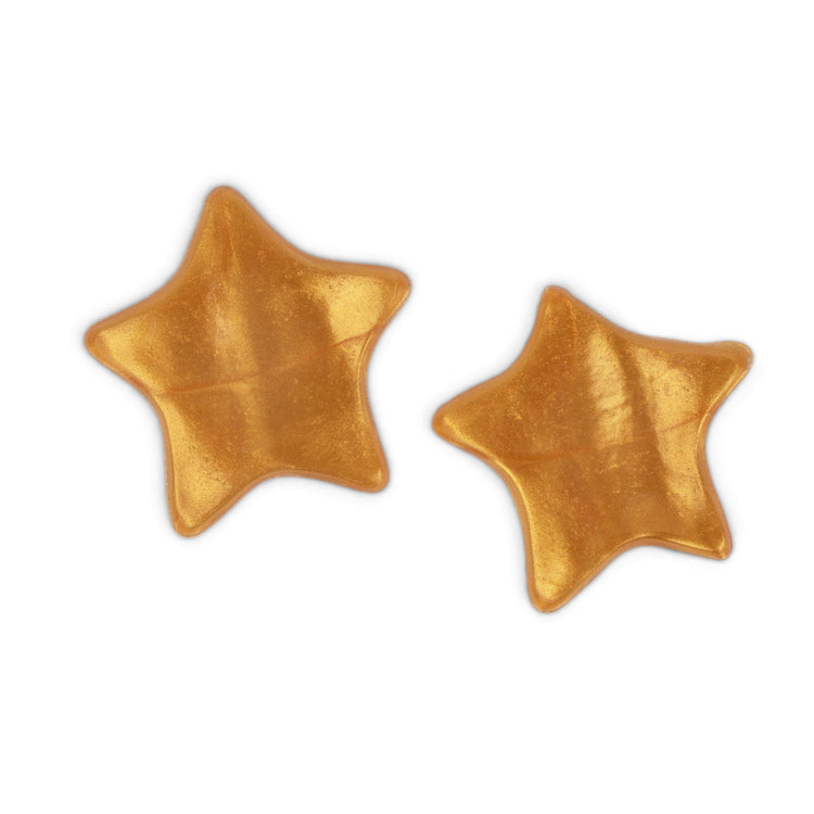 Metamorphosis Two gold, star-shaped hydrogel superstar models or patches, used for advanced skincare treatments