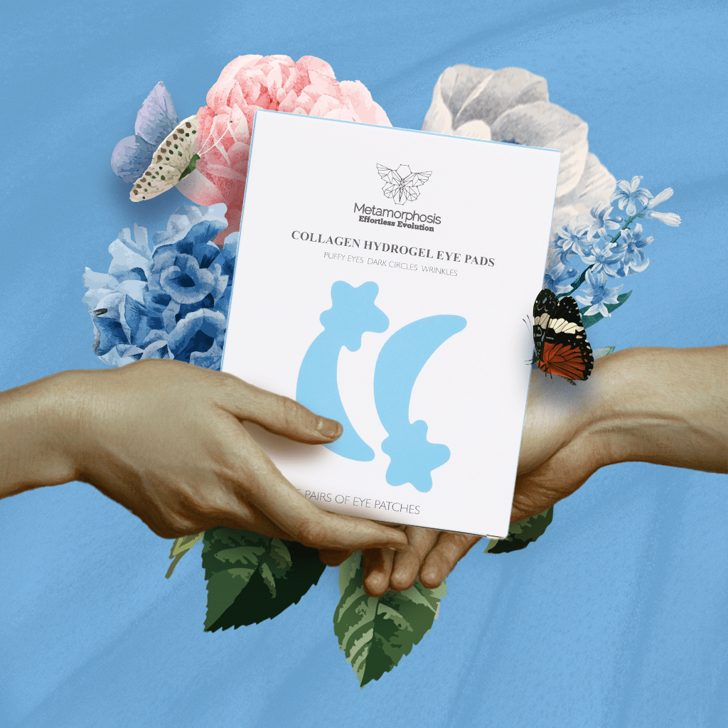 Hands holding eye patch box with flowers and butterflies.