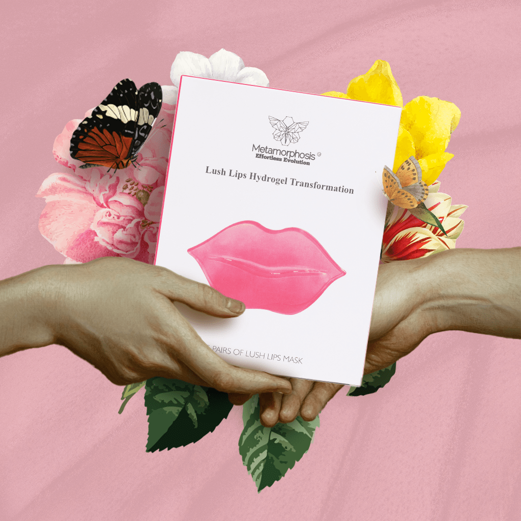 Hands holding a lip mask box with flowers and butterflies.