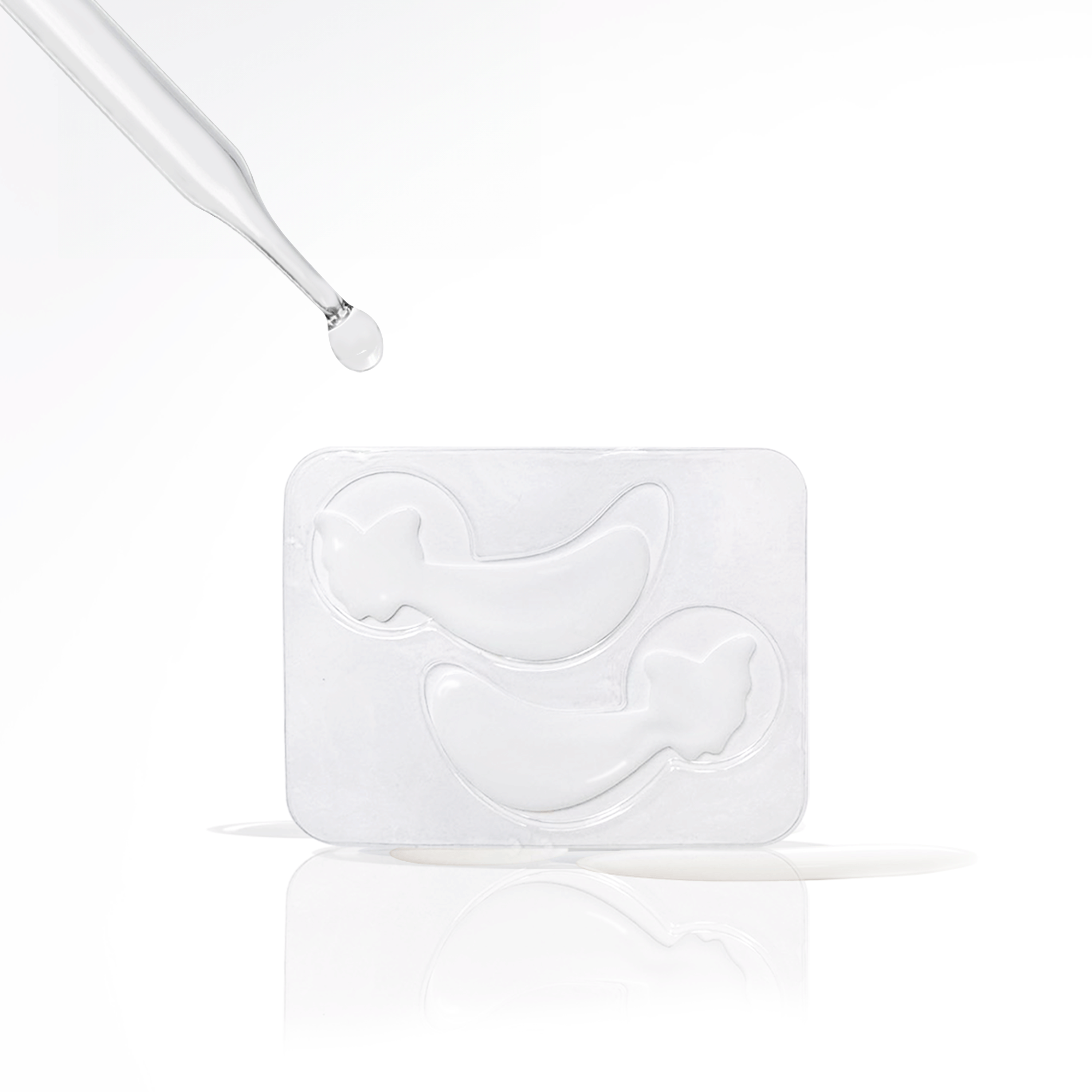 Metamorphosis A clear dropper dispensing a drop of serum over two white eye masks in a plastic tray, illustrating the application method for eye masks.