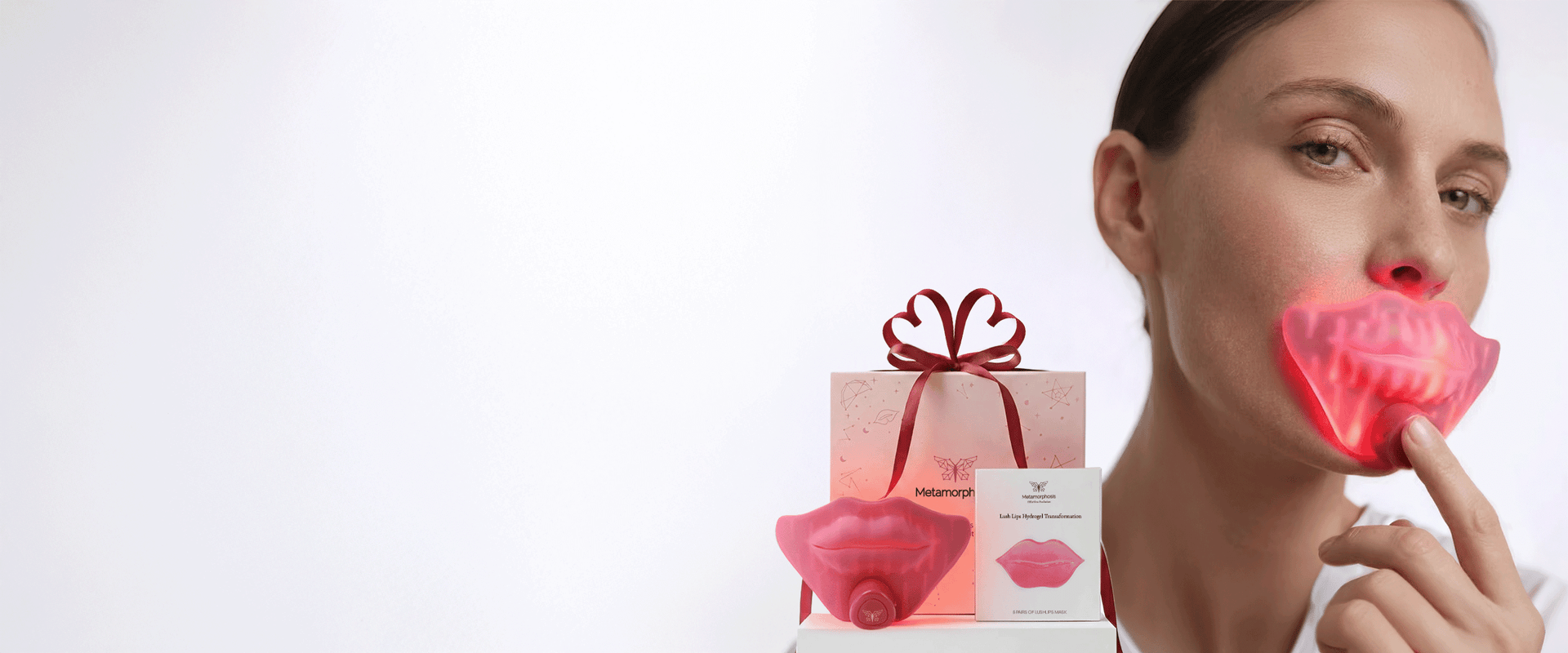 Woman using Metamorphosis LED lip light therapy device for lip rejuvenation and hydration